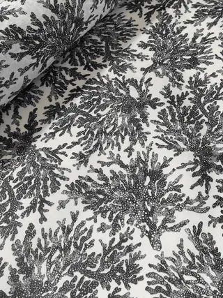 Mantel antimanchas Coral de hule resinado en color Negro